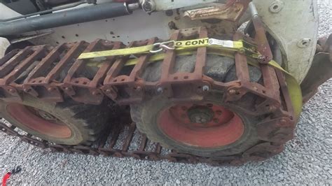 hydraulic system overheating loose grouser tracks on bobcat skid steer|skid steer tracks loose tension.